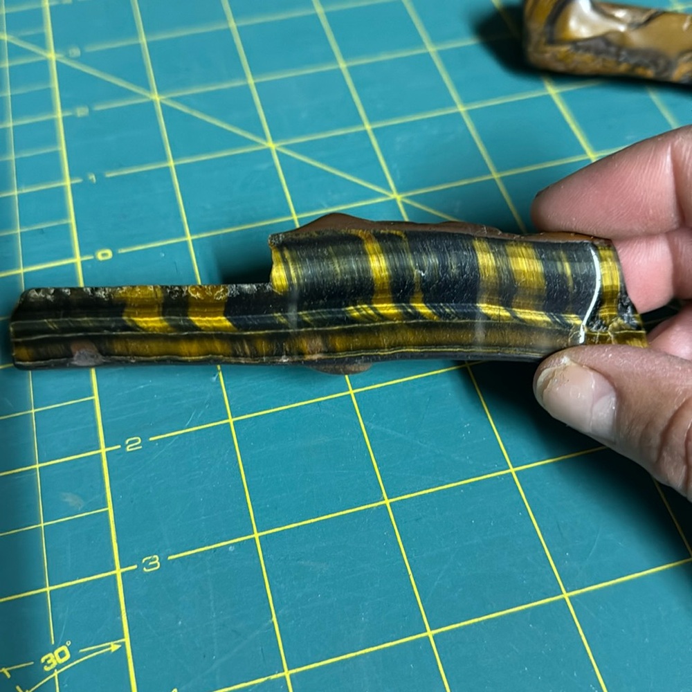 Yellow and blue tag eye polished